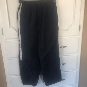 Boys plastic coated trousers size Youth medium